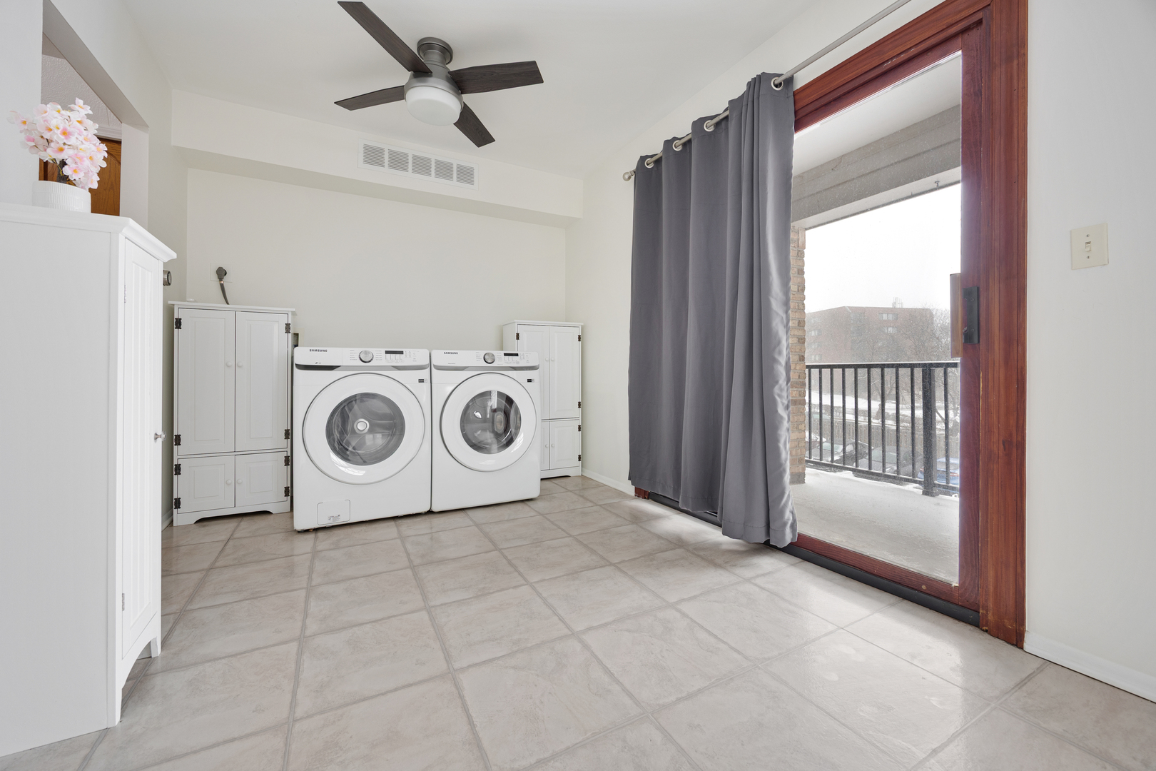1724 Fayette Walk, Unit J Hoffman Estates, IL 60169 - Photo 7 of 15 a view of a storage & utility room with washer and dryer