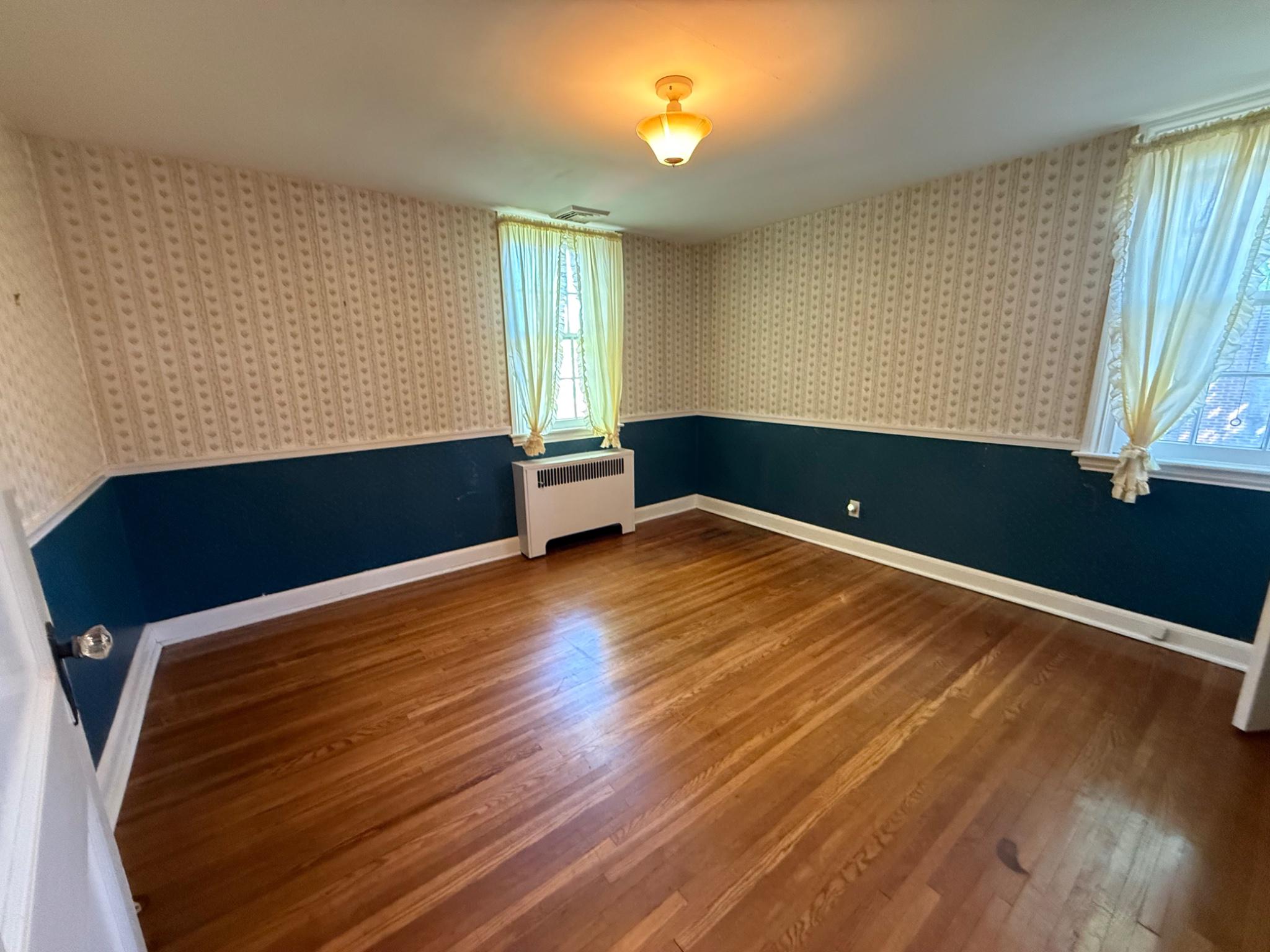 111 South Norwinden Drive Springfield, PA 19064 - Photo 8 of 13 Bedroom #2 with beautiful hardwood floors