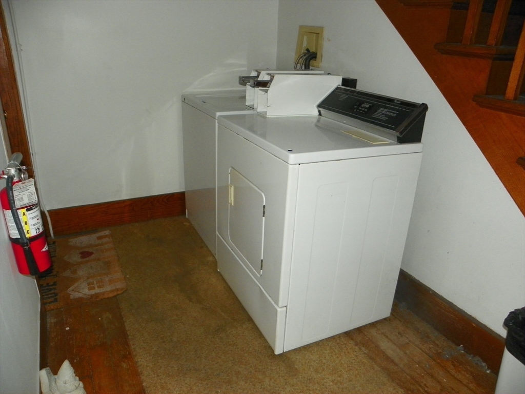 19 Franklin Court, Unit 1R Gardner, MA 01440 - Photo 8 of 8 a utility room with dryer and washer