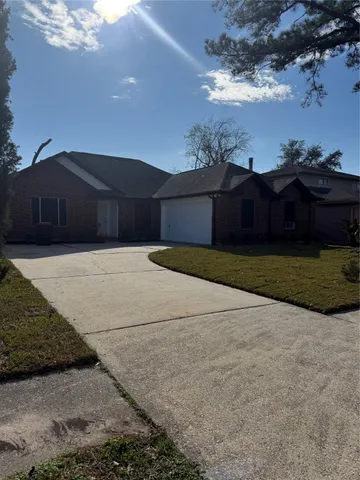 a house with yard in front of it
