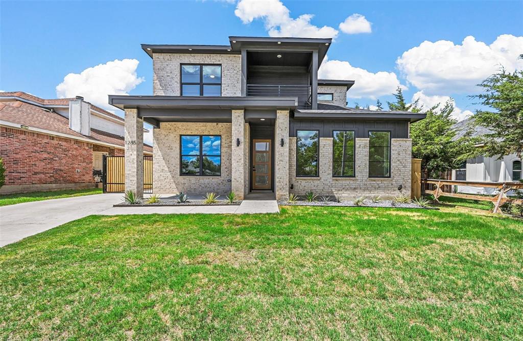 1285 Cedardale Road Lancaster, TX 75134 - Photo 1 of 1 View of front facade with a front yard