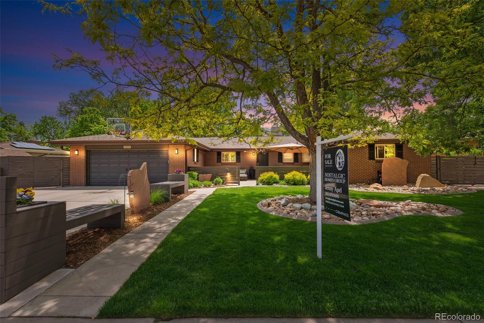 12256 West 34th Place Wheat Ridge, CO 80033 - Photo 1 of 50 a view of backyard of house with green space