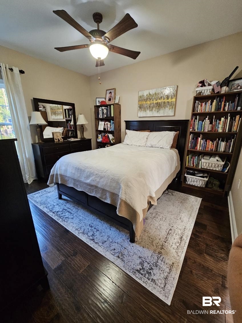 41416 Davis Duck Road Bay Minette, AL 36507 - Photo 46 of 72 Bedroom with ceiling fan and dark wood-type flooring