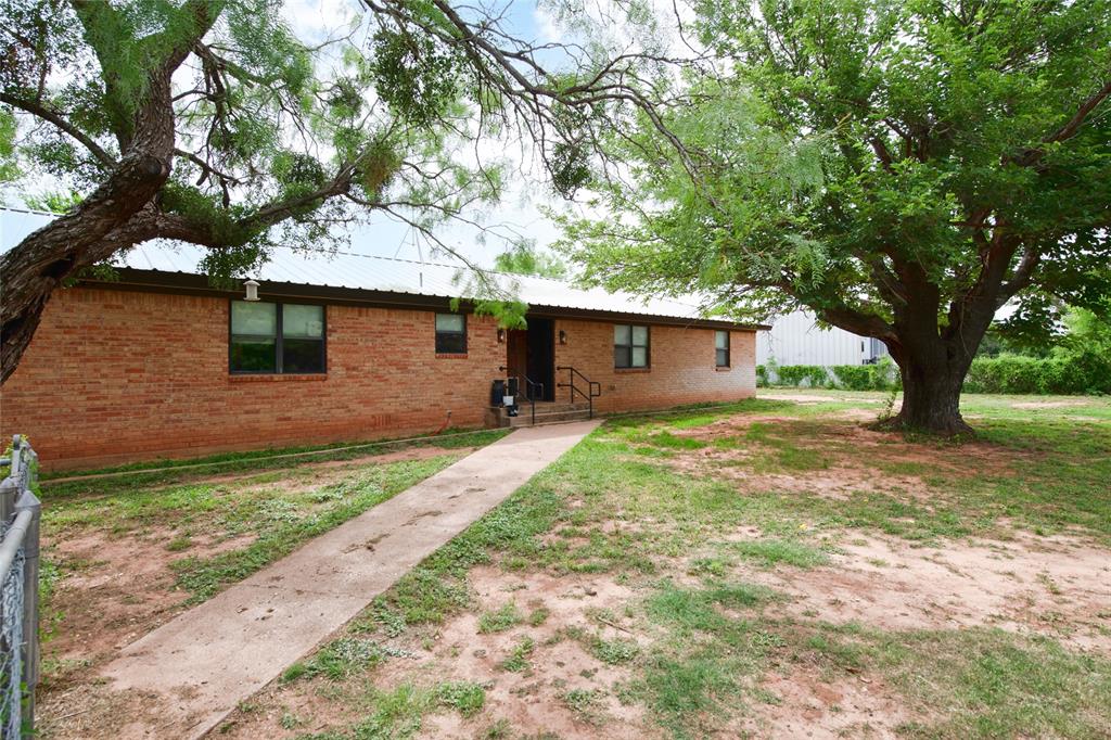 117 Buchanan Road Abilene, TX 79606 - Photo 23 of 40 a front view of house with yard and trees
