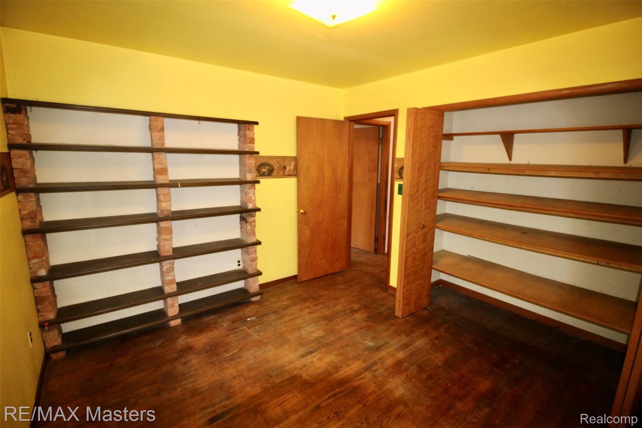 12040 Creek Road Carleton, MI 48117 - Photo 21 of 47 there are built in cabinets in both the closet and open ones one one wall