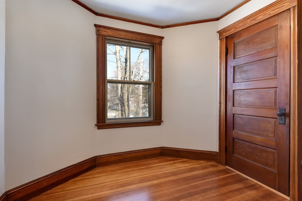 80 Spring Road Needham, MA 02494 - Photo 14 of 25 a view of empty room with wooden floor and fan