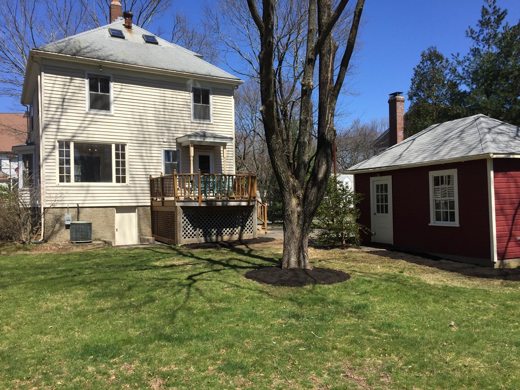 80 Spring Road Needham, MA 02494 - Photo 24 of 25 a front view of a house with a yard