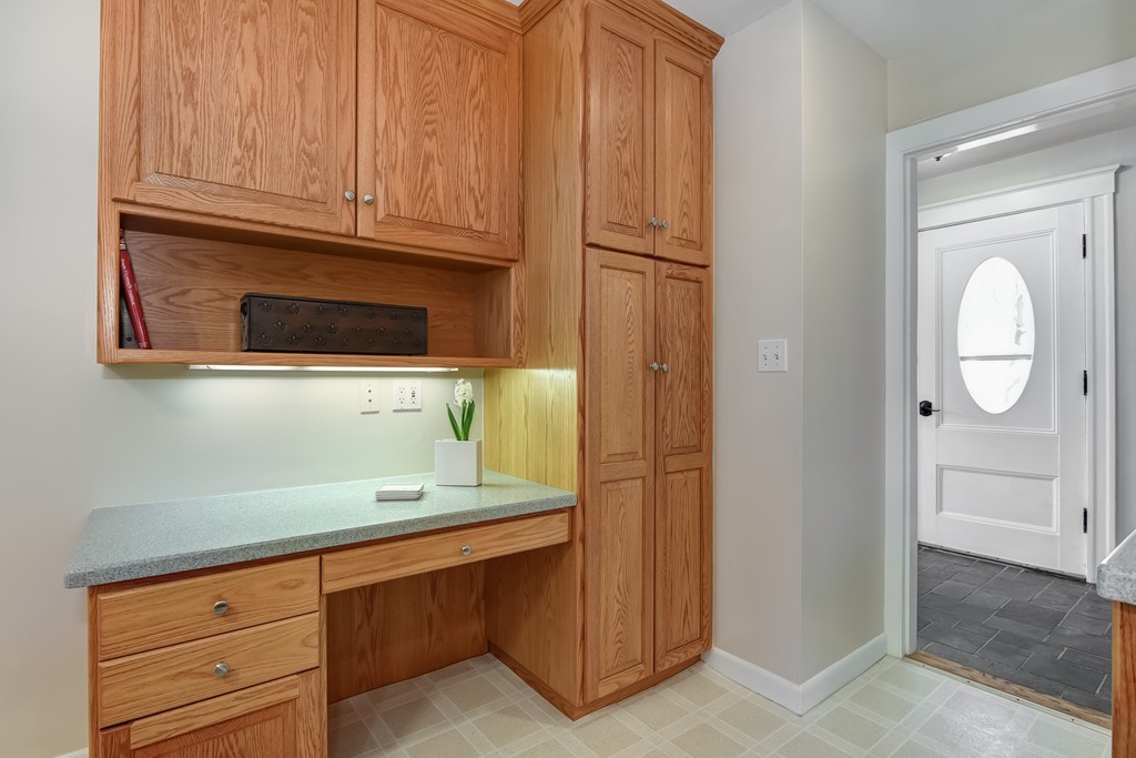 80 Spring Road Needham, MA 02494 - Photo 5 of 25 a bathroom with a sink and a mirror