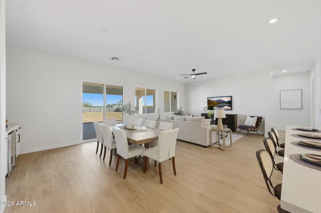 a kitchen with a sink and a potted plant