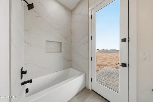 a front view of a house with a garage