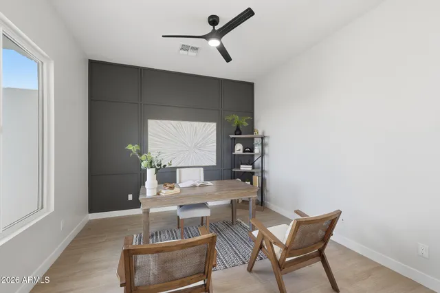 a view of a dining room with furniture