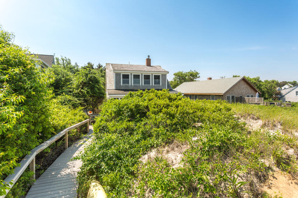 240 Robbins Hill Road Brewster, MA 02631 - Photo 17 of 35 a view of a house with roof deck