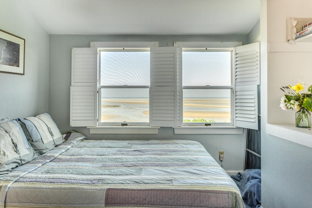 240 Robbins Hill Road Brewster, MA 02631 - Photo 23 of 35 a bedroom with a bed and a window