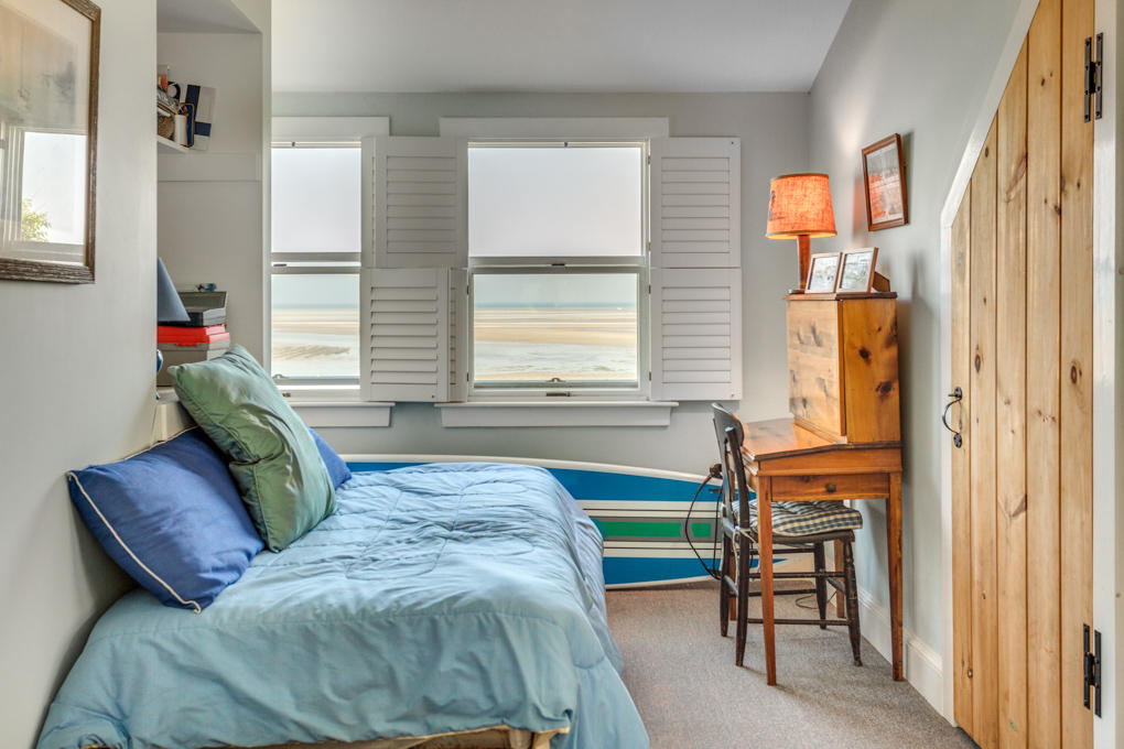 240 Robbins Hill Road Brewster, MA 02631 - Photo 25 of 35 a living room with furniture and a window