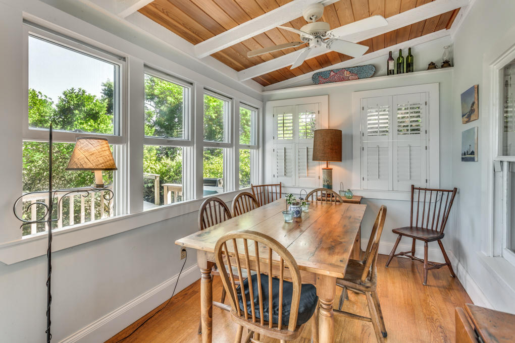 240 Robbins Hill Road Brewster, MA 02631 - Photo 7 of 35 a view of a dining room with furniture window and outside view
