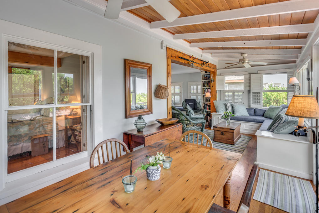 240 Robbins Hill Road Brewster, MA 02631 - Photo 8 of 35 a view of a dining room with furniture window and wooden floor