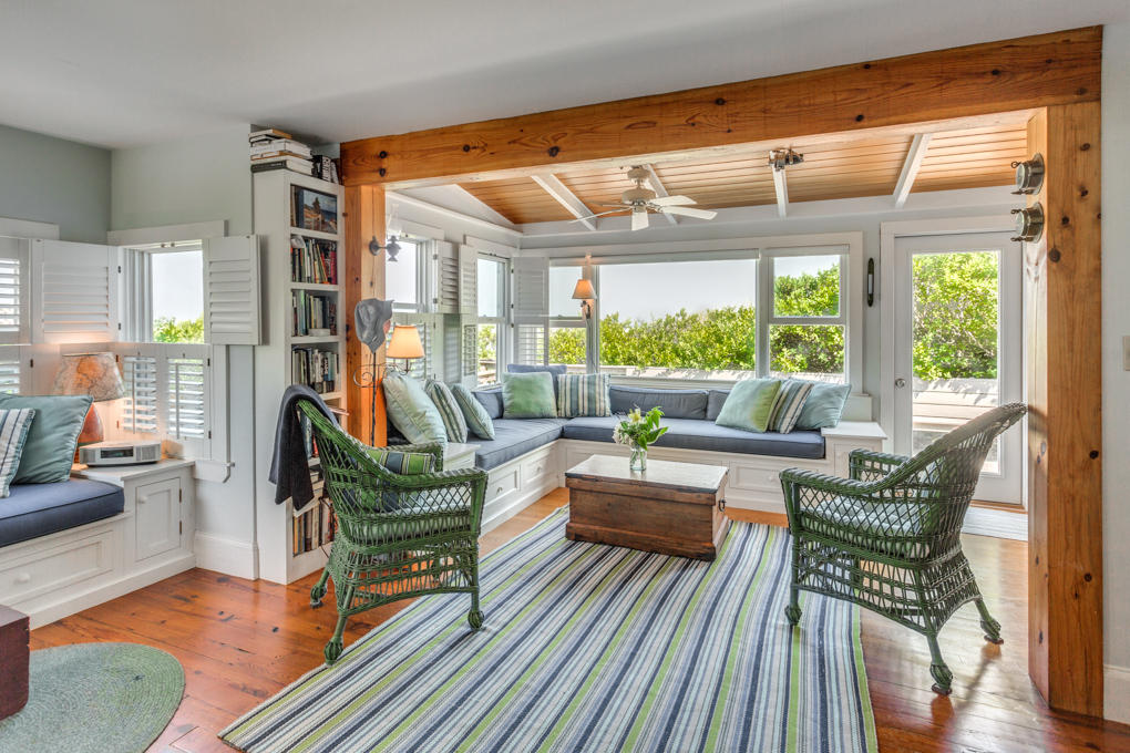 240 Robbins Hill Road Brewster, MA 02631 - Photo 10 of 35 a living room with furniture and a large window