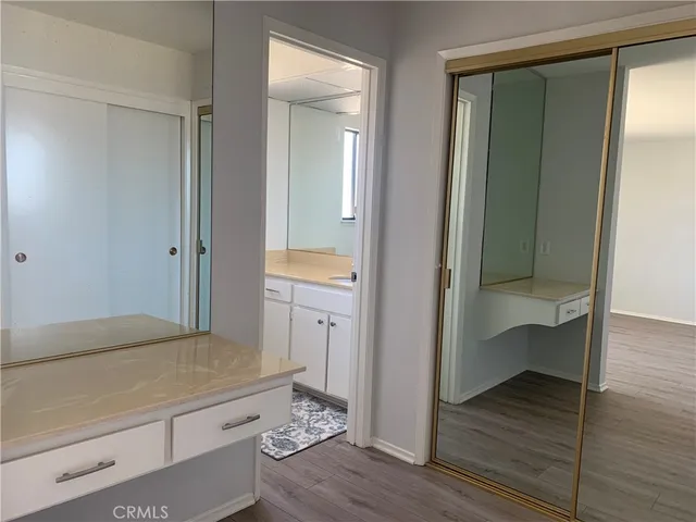 a view of bathroom with a hardwood floor and a sink