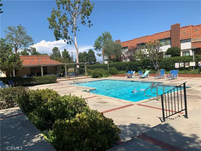 a view of a swimming pool with a patio