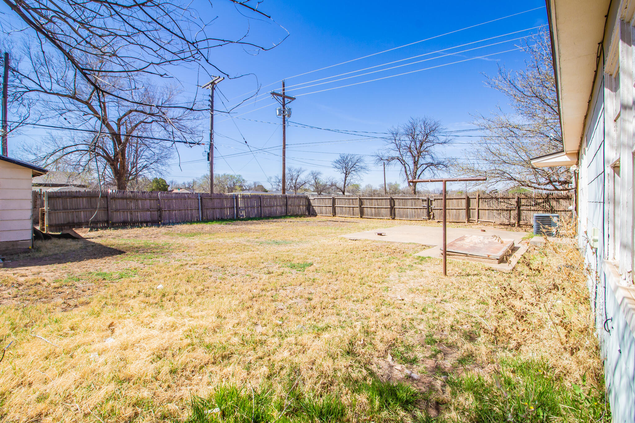 4621 35th Street Lubbock, TX 79414 - Photo 18 of 19 a view of yard with swimming pool
