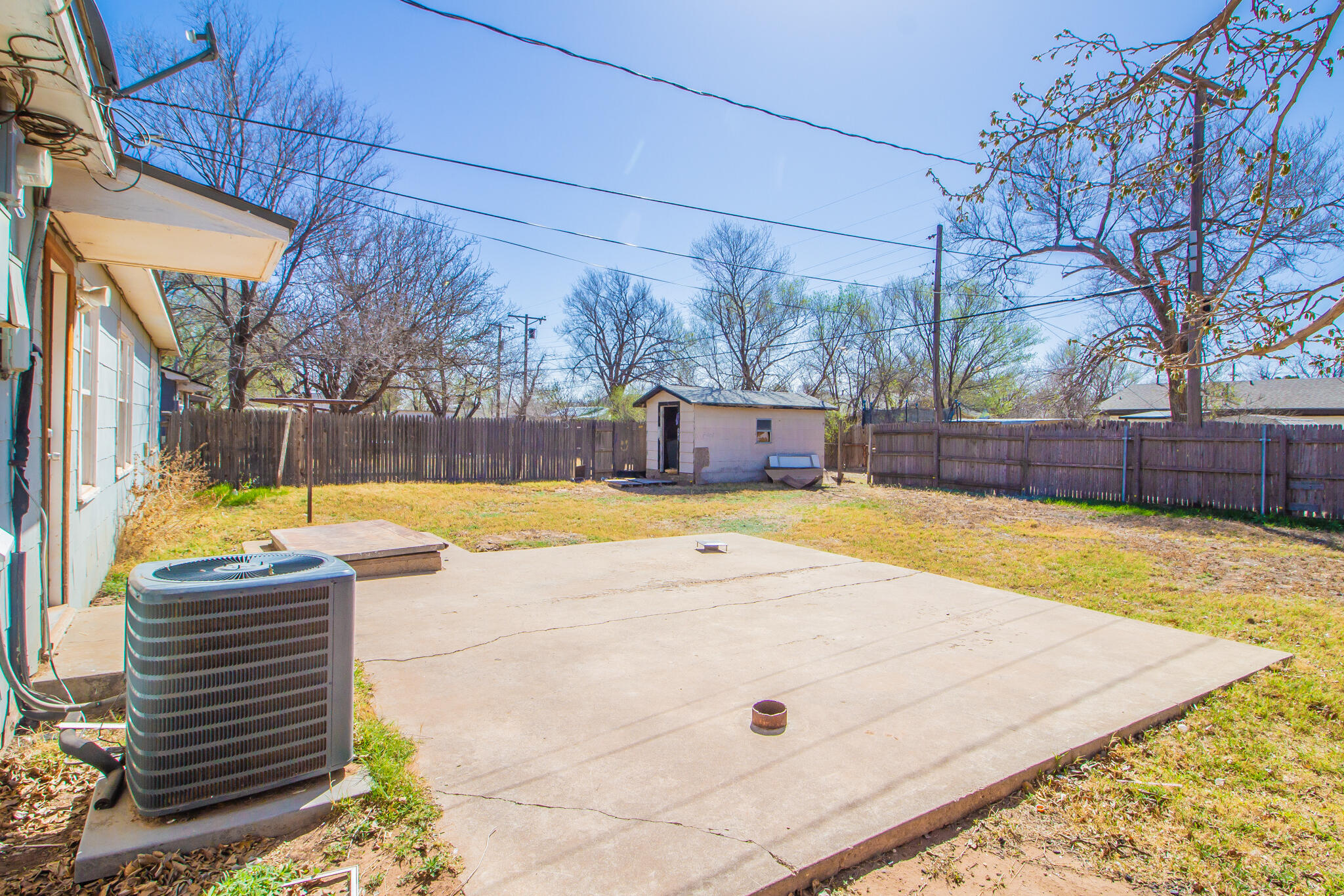 4621 35th Street Lubbock, TX 79414 - Photo 19 of 19 a view of a swimming pool with a patio