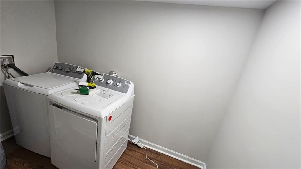 471 Perkins Circle Canton, GA 30115 - Photo 12 of 20 a utility room with dryer and washer