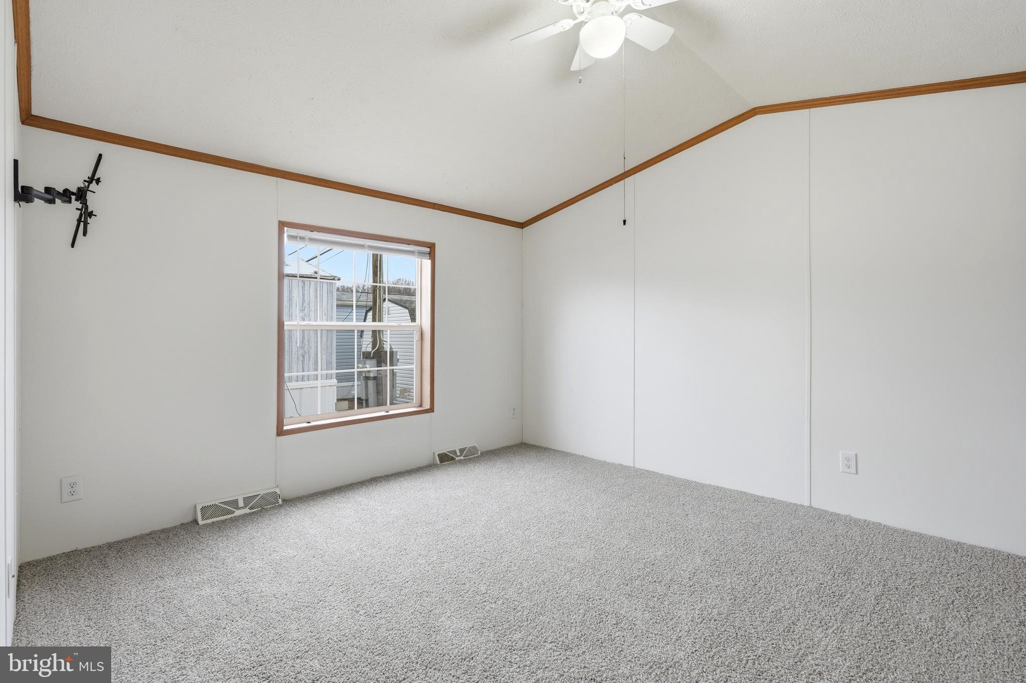 507 Canter Road Wilmington, DE 19810 - Photo 13 of 15 a view of an empty room with a window