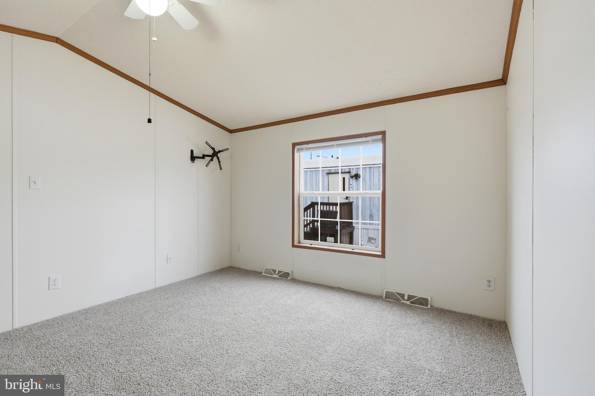 507 Canter Road Wilmington, DE 19810 - Photo 14 of 15 a view of an empty room with a window