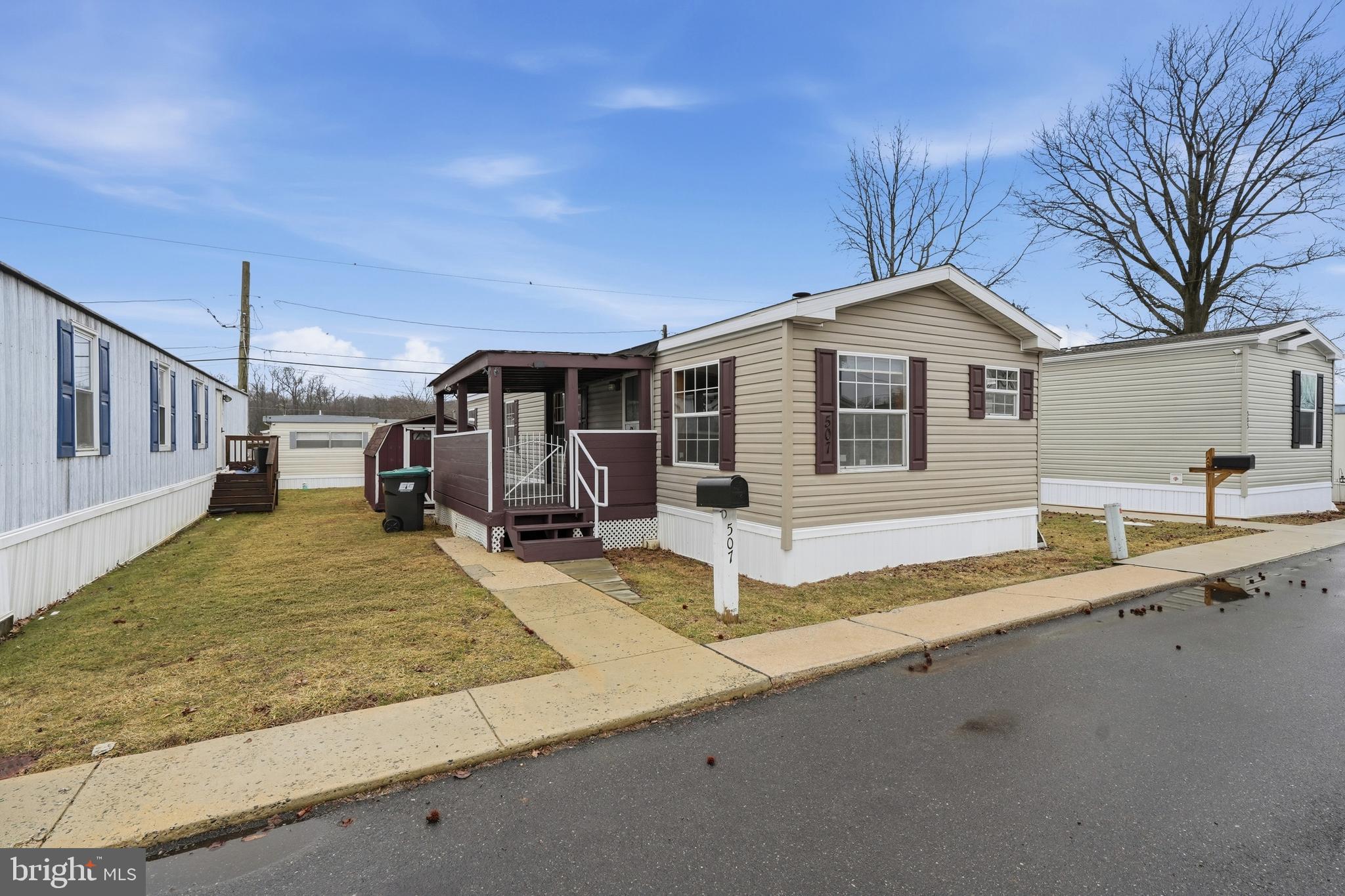 507 Canter Road Wilmington, DE 19810 - Photo 2 of 15 a view of a house with a patio