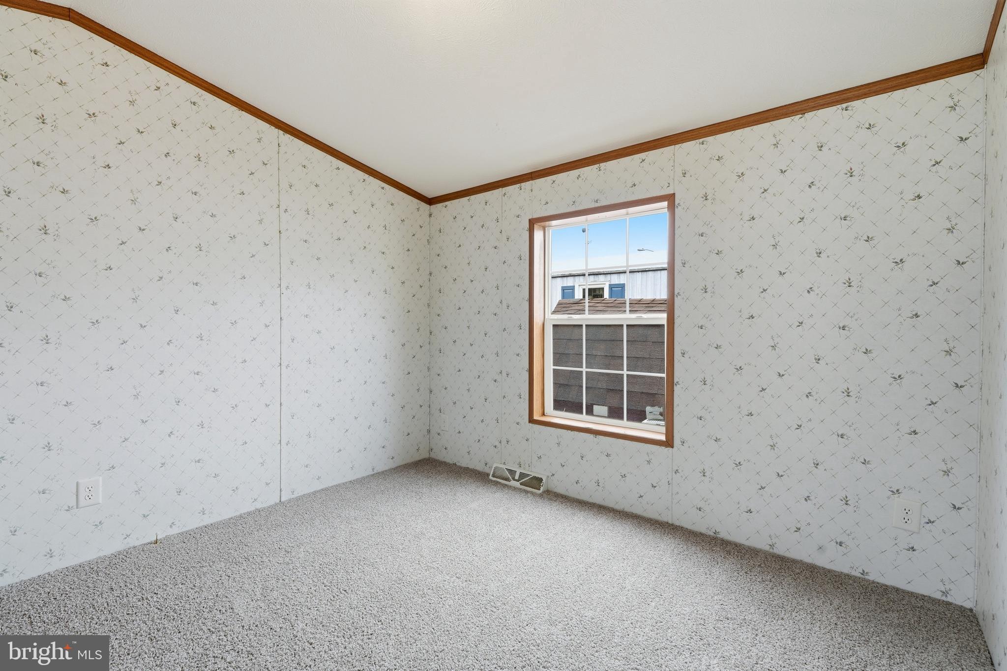 507 Canter Road Wilmington, DE 19810 - Photo 10 of 15 a view of an empty room with a window