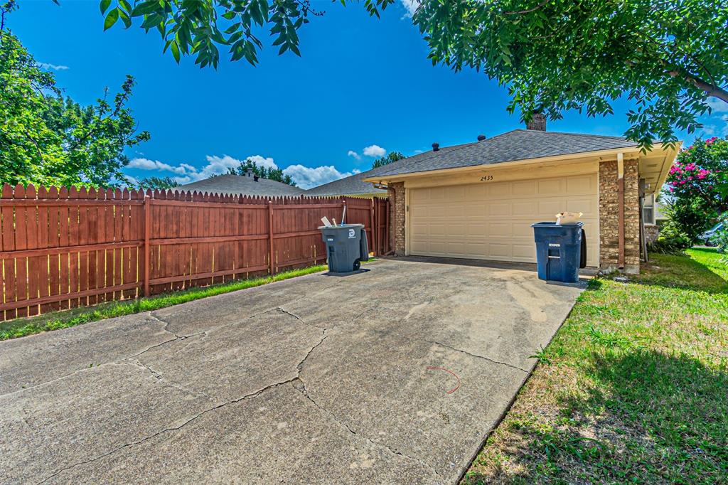 2435 Old Mill Road Dallas, TX 75287 - Photo 30 of 30 a view of a backyard
