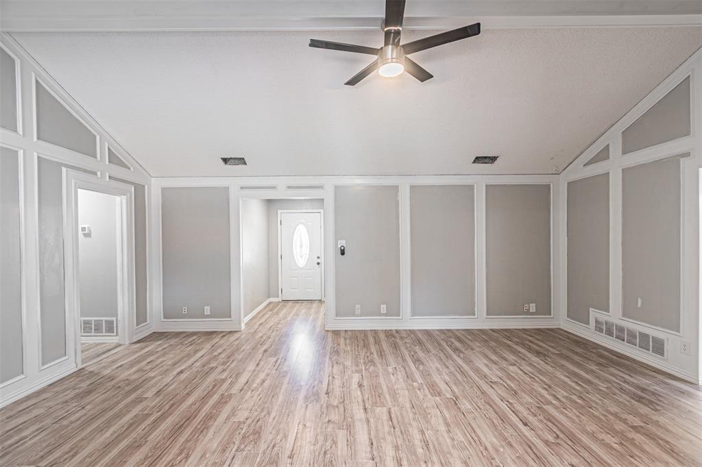 2435 Old Mill Road Dallas, TX 75287 - Photo 10 of 30 a view of empty room with wooden floor