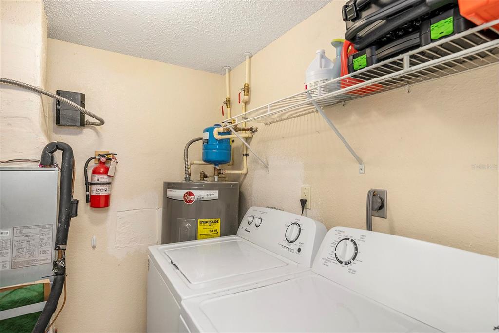 3711 West Iowa Avenue, Unit 214 Tampa, FL 33611 - Photo 21 of 29 a utility room with dryer and washer