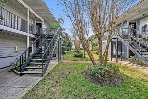 a view of a yard in front of a house