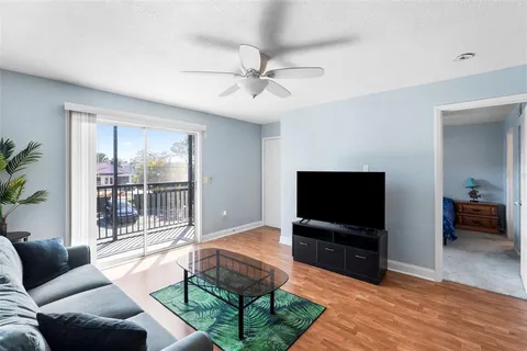 a kitchen with stainless steel appliances a refrigerator and a stove