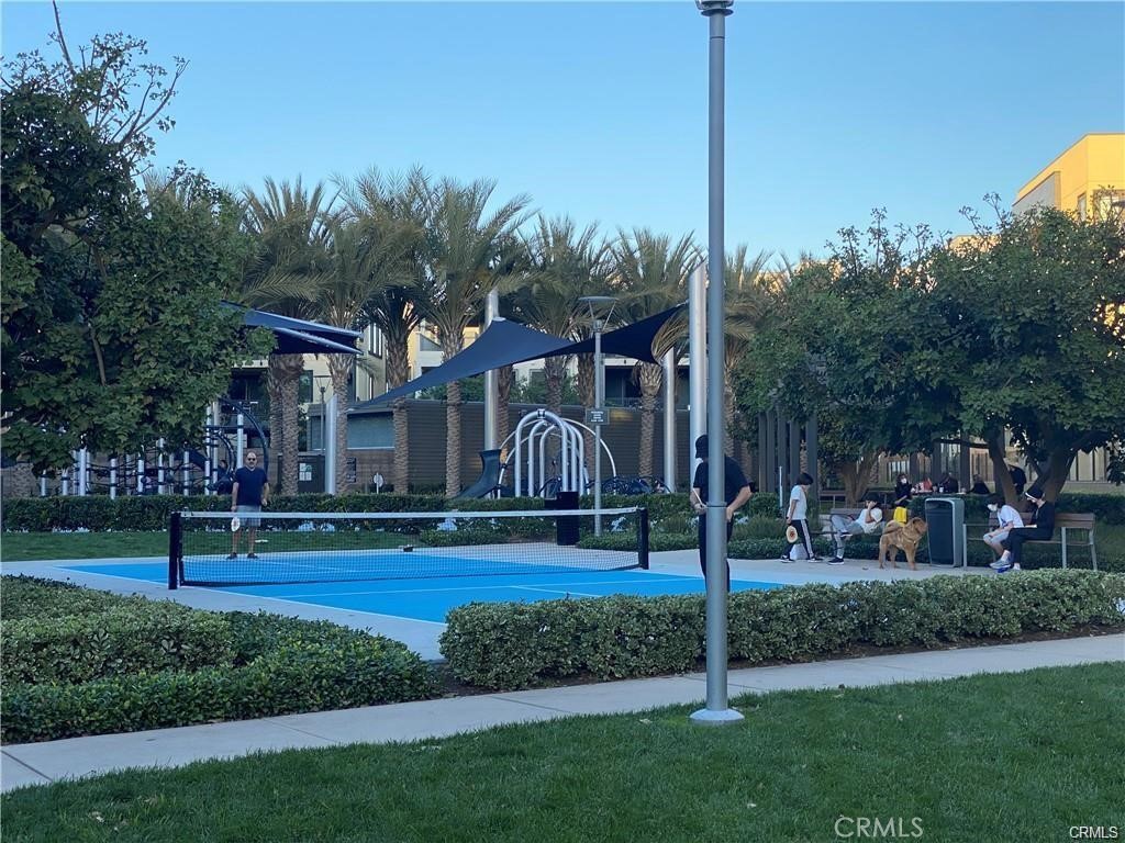 174 Tribeca Irvine, CA 92612 - Photo 33 of 37 a front view of a house with a yard