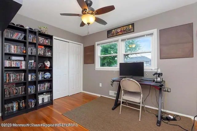 a workspace with a bookshelf