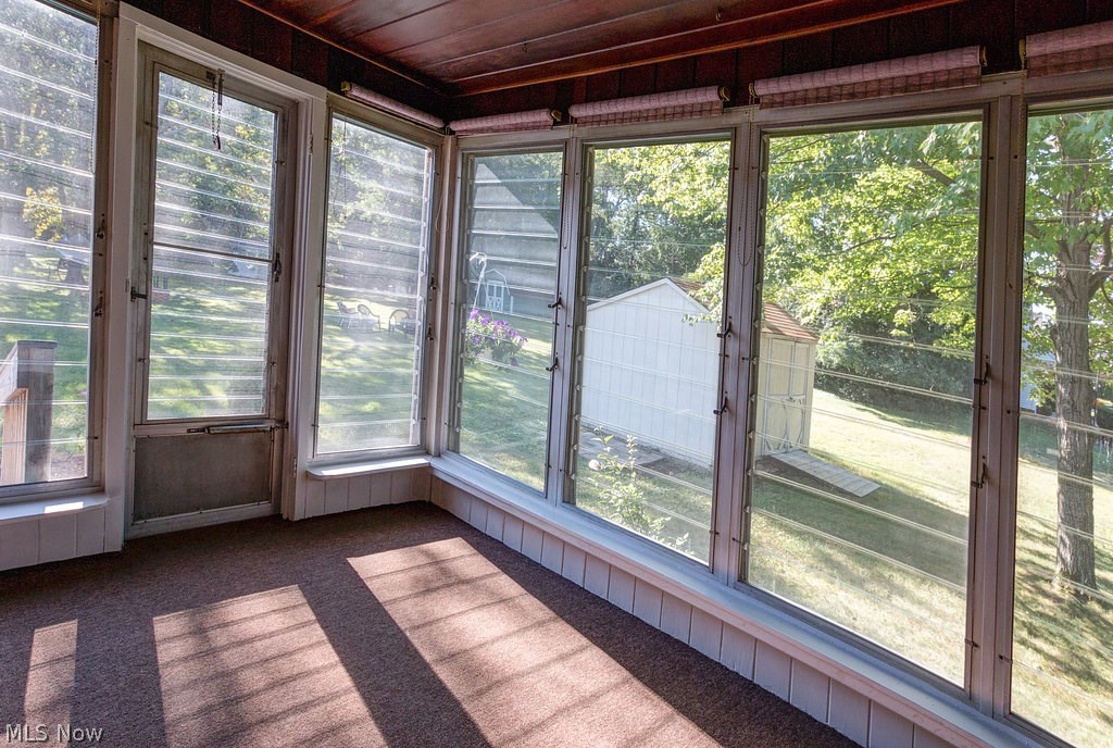 30306 Ridge Road Wickliffe, OH 44092 - Photo 2 of 31 Peaceful Sun room at the back of the home