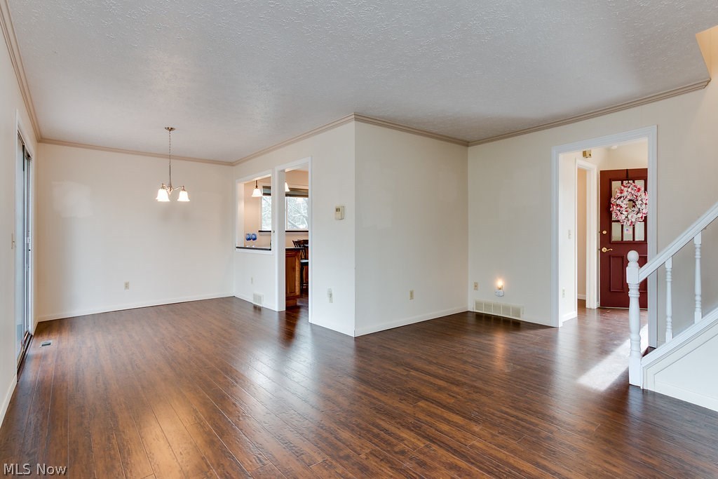 9801 Old Johnnycake Ridge Road Mentor, OH 44060 - Photo 11 of 32 Spacious first floor has wood like laminate floors through out, provides a seamless transition from room to room.