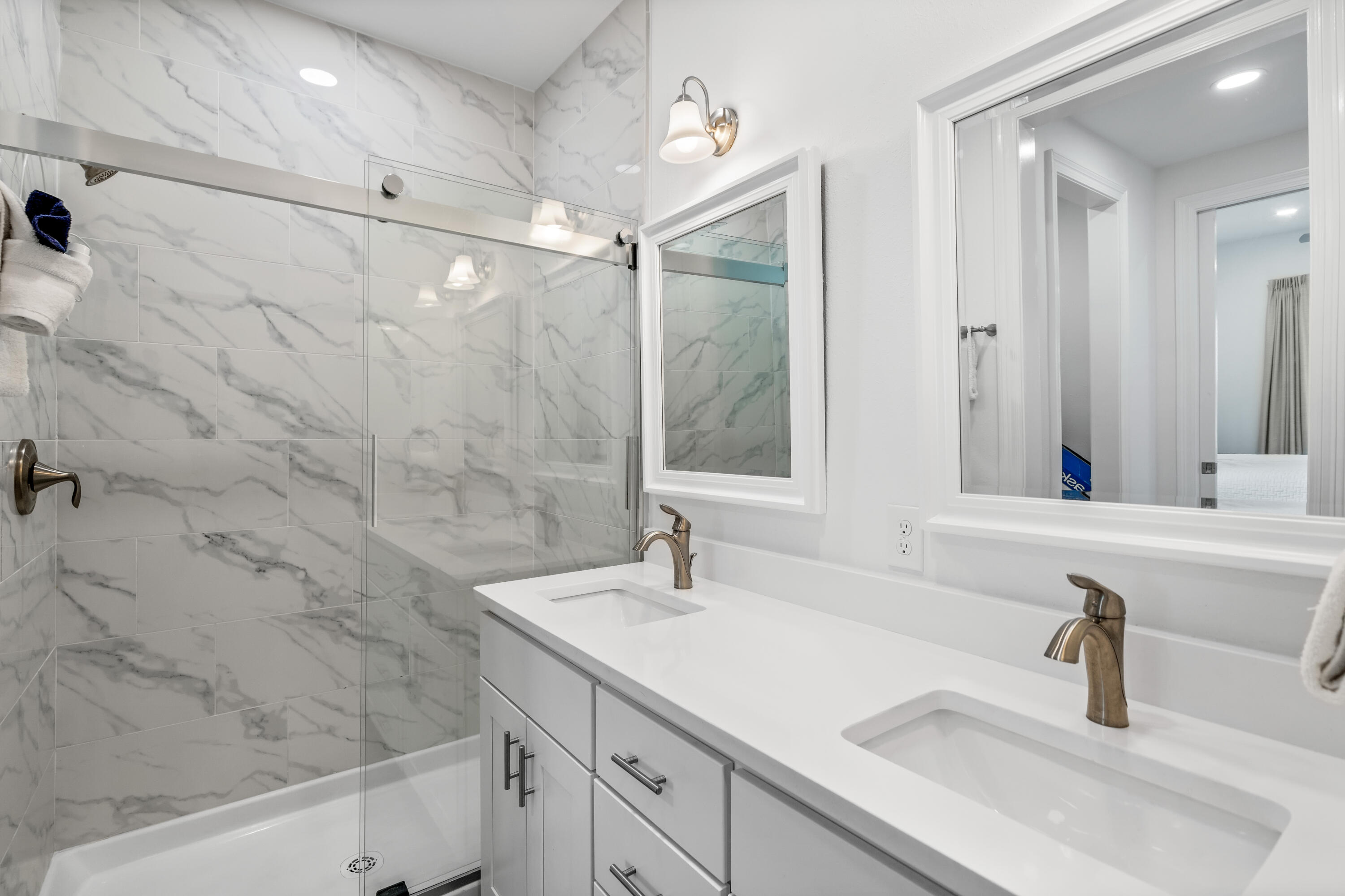 1740 South County Highway, Unit 301 Santa Rosa Beach, FL 32459 - Photo 25 of 45 a bathroom with a sink and a mirror