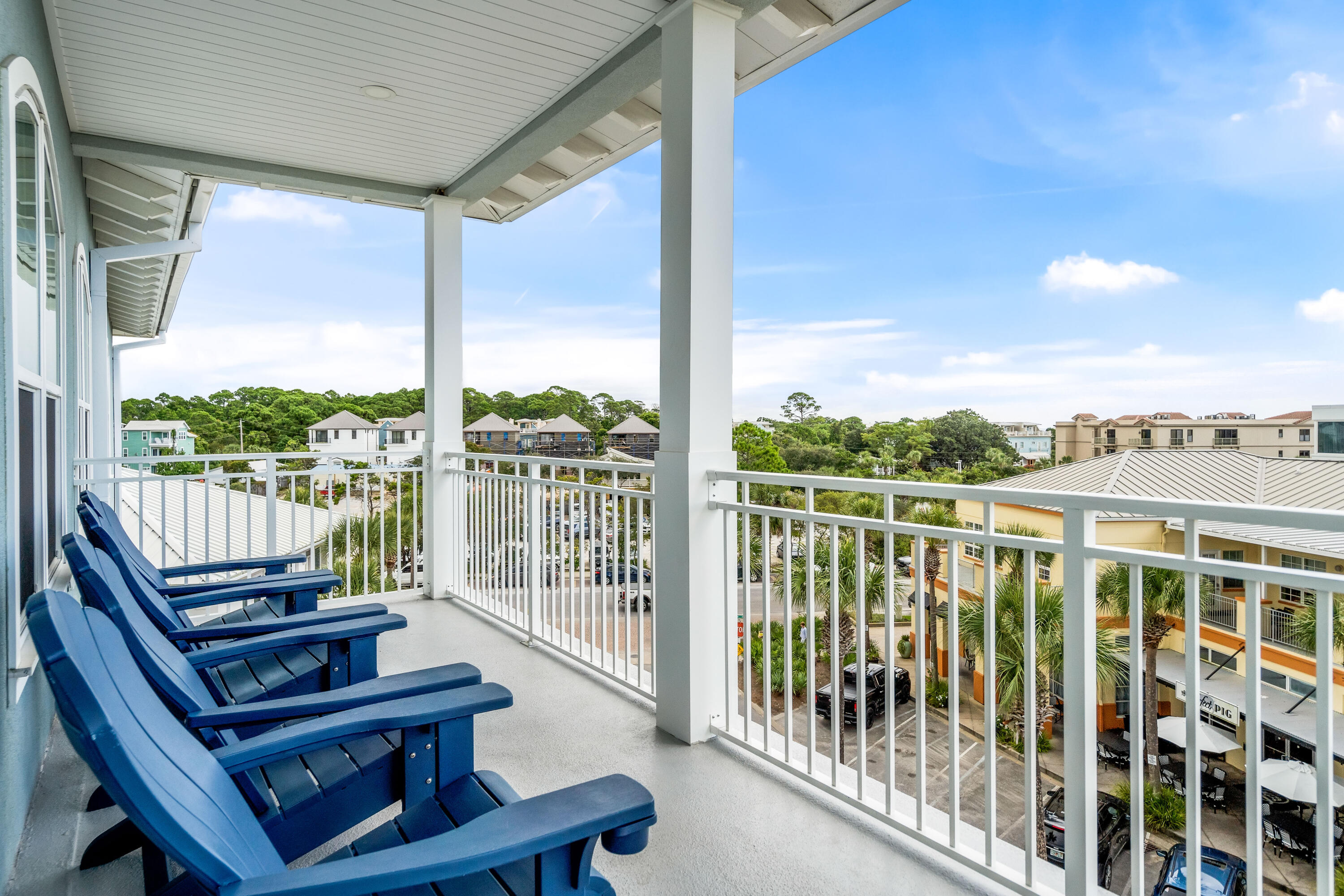 1740 South County Highway, Unit 301 Santa Rosa Beach, FL 32459 - Photo 29 of 45 a view of a city from a balcony with furniture