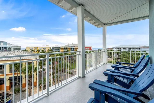 a view of a balcony with wooden floor