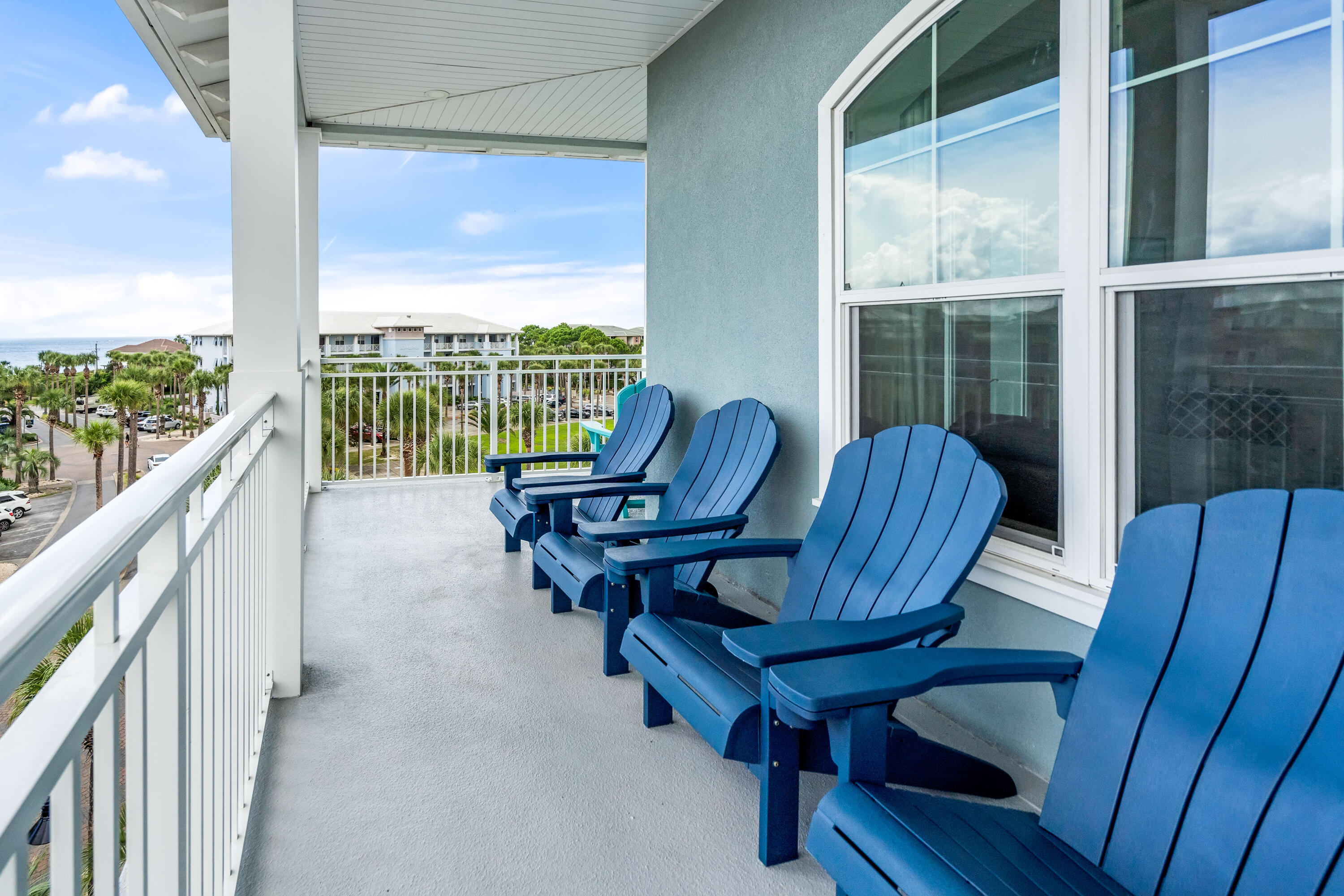 1740 South County Highway, Unit 301 Santa Rosa Beach, FL 32459 - Photo 3 of 45 a living room with furniture and a floor to ceiling window