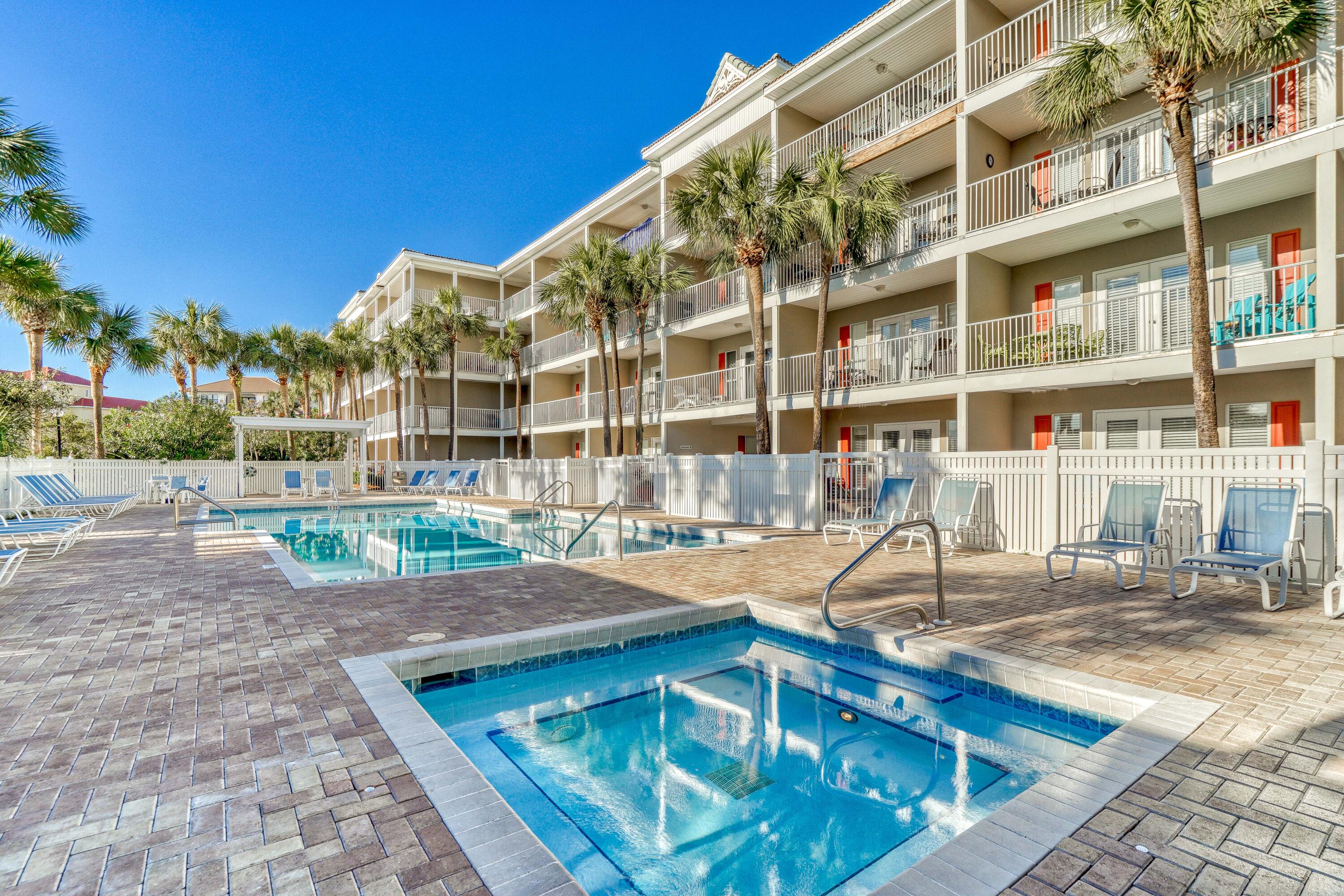 1740 South County Highway, Unit 301 Santa Rosa Beach, FL 32459 - Photo 39 of 45 a view of a building with a swimming pool
