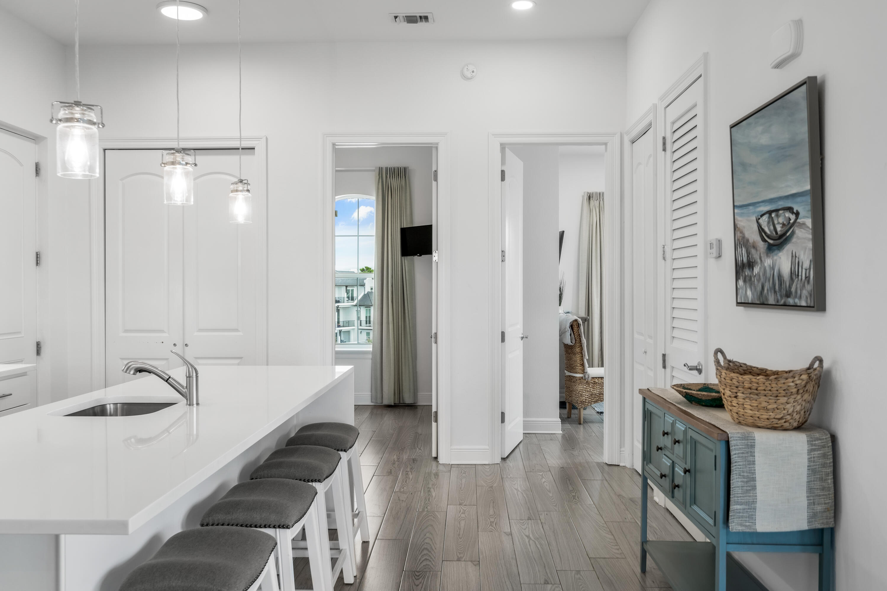 1740 South County Highway, Unit 301 Santa Rosa Beach, FL 32459 - Photo 9 of 45 a large bathroom with a tub a sink and mirrors