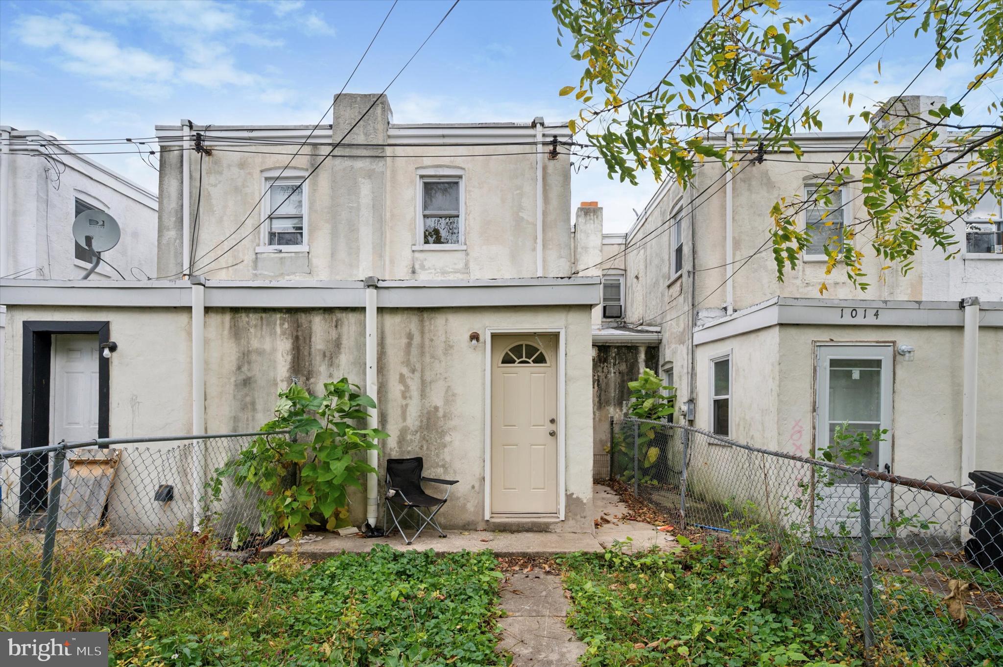 1016 Potter Street Chester, PA 19013 - Photo 15 of 15 a view of a white house next to a yard