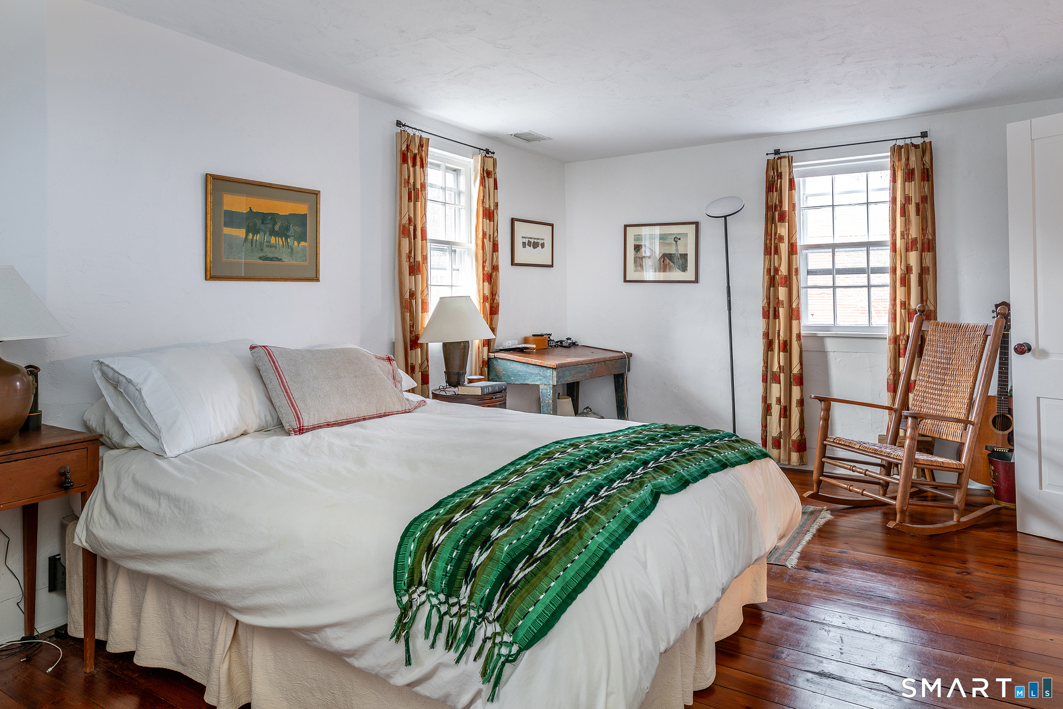 197 Skyline Ridge Road Bridgewater, CT 06752 - Photo 29 of 31 a bedroom with a bed and wooden floor