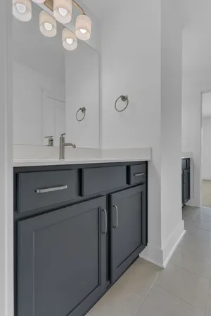 a room with cabinets and a clock