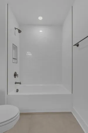 a view of a house with a yard and deck