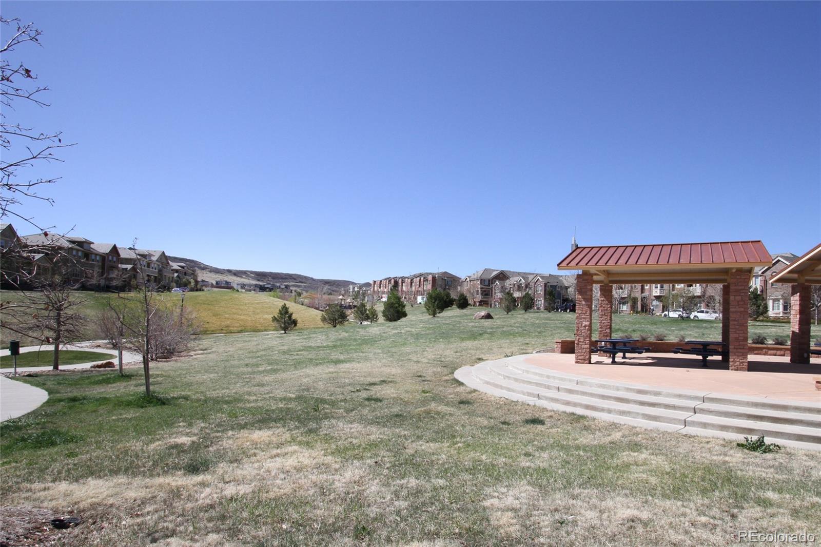 9228 Ridgegate Parkway Lone Tree, CO 80124 - Photo 23 of 32 a view of a park with big trees